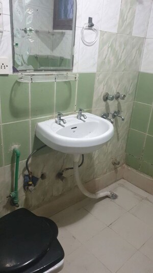 Bathroom in 3 BHK Apartment at Sector 12 Dwarka – for Rent