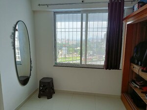 Room in 2 BHK Apartment at Jhamtani Ace Aurum Phase III, Ravet – for Rent