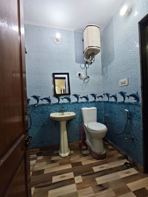 Bathroom in 3 BHK Builder Floor at Green Fields Colony – for Rent