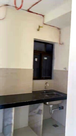 Kitchen in 3 BHK Apartment at Siddha Sky Phase 3, Wadala – for Rent