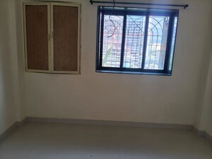 Room in 2 BHK Apartment at Ganpati CHS, Nerul Sector 19 – for Rent
