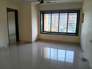 Room in 2 BHK Apartment at Ganpati CHS, Nerul Sector 19 – for Rent