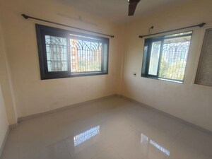 Room in 2 BHK Apartment at Ganpati CHS, Nerul Sector 19 – for Rent