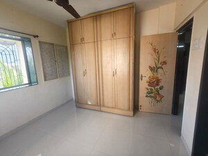 Room in 2 BHK Apartment at Ganpati CHS, Nerul Sector 19 – for Rent