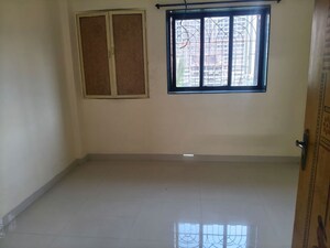 Room in 2 BHK Apartment at Ganpati CHS, Nerul Sector 19 – for Rent