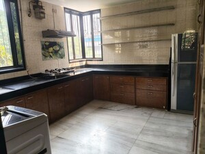 Kitchen in 2 BHK Apartment at Garden Avenue, Nerul Sector 21 – for Rent