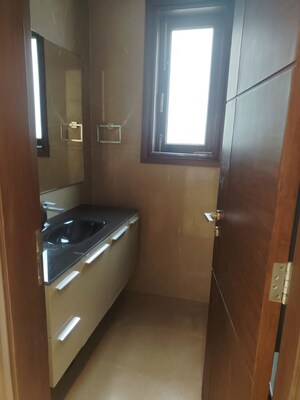 Bathroom in 4 BHK Apartment at Vasant Vihar – for Rent