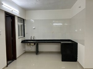 Kitchen in 1.5 BHK Apartment at Unnati Gagan Cefiro, Undri – for Rent