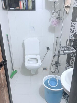 Bathroom in 1 BHK Apartment at Lokhandwala Complex – for Sale