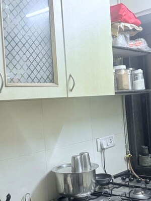 Kitchen in 1 BHK Apartment at Lokhandwala Complex – for Sale