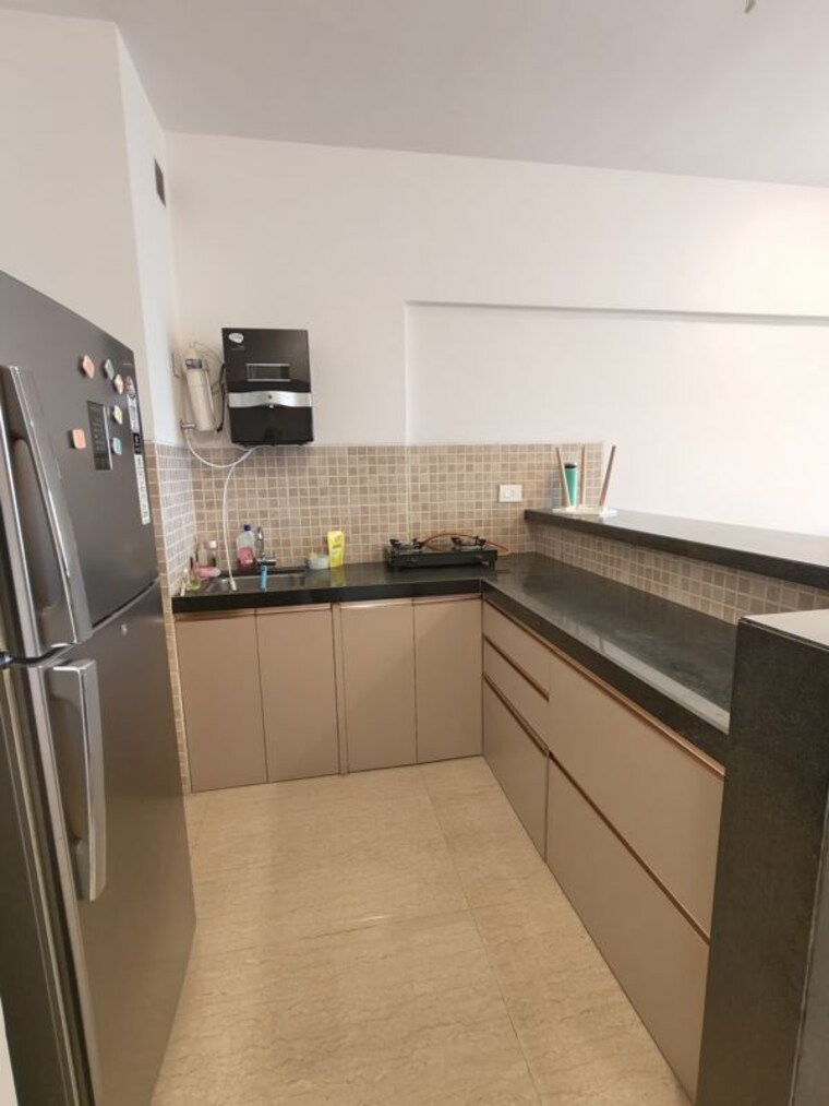 Kitchen, lodha-belmondo 1 Bedroom 711 Sq.Ft. Apartment In Gahunje Pune 10790105