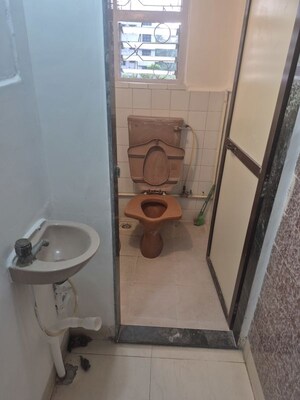 Bathroom in 2 BHK Apartment at Radha Krishna CHS, Charai – for Rent