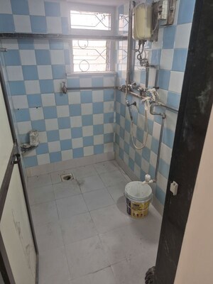 Bathroom in 2 BHK Apartment at Radha Krishna CHS, Charai – for Rent