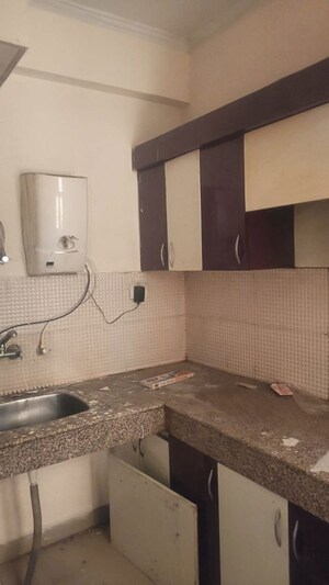 Kitchen in 3 BHK Apartment at Mahagun Mywoods, Sector 16c Greater Noida – for Rent