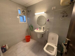 Bathroom in 3 BHK Apartment at Gaur City 2 – for Sale