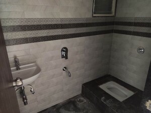 Bathroom in 2 BHK Apartment at Kohinoor Reina, Kondhwa – for Rent