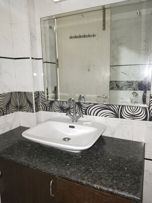 Bathroom in 3 BHK Apartment at Shivalik Colony – for Rent