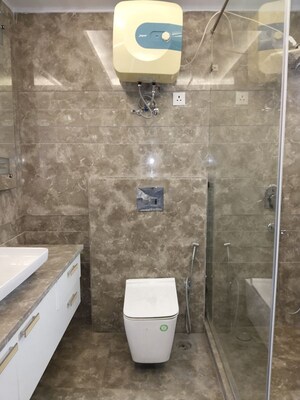 Bathroom in 3 BHK Apartment at Defence Colony – for Rent