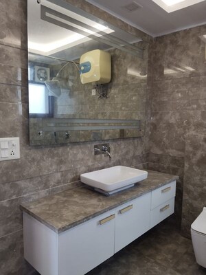 Bathroom in 3 BHK Apartment at Defence Colony – for Rent