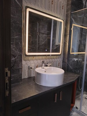 Bathroom in 3.5 BHK Apartment at Defence Colony – for Rent