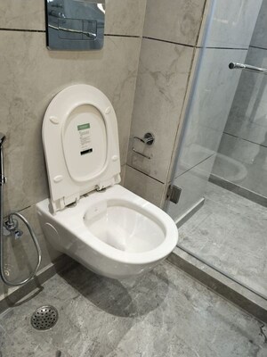 Bathroom in 3.5 BHK Apartment at Defence Colony – for Rent