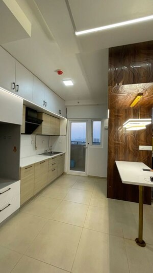 Kitchen in 3 BHK Apartment at Bhartiya Nikoo Homes Phase 2, Thanisandra Main Road – for Rent
