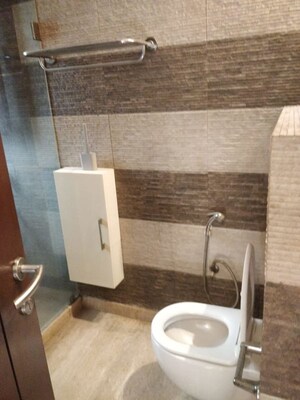 Bathroom in 4 BHK Apartment at Defence Colony – for Rent