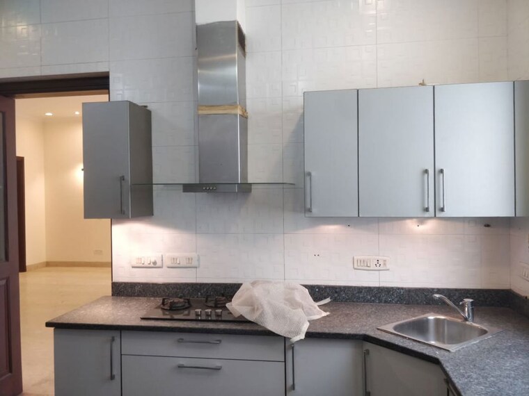 Kitchen, defence colony 4 Bedroom 5000 Sq.Ft. Apartment In Defence Colony Delhi 10790522