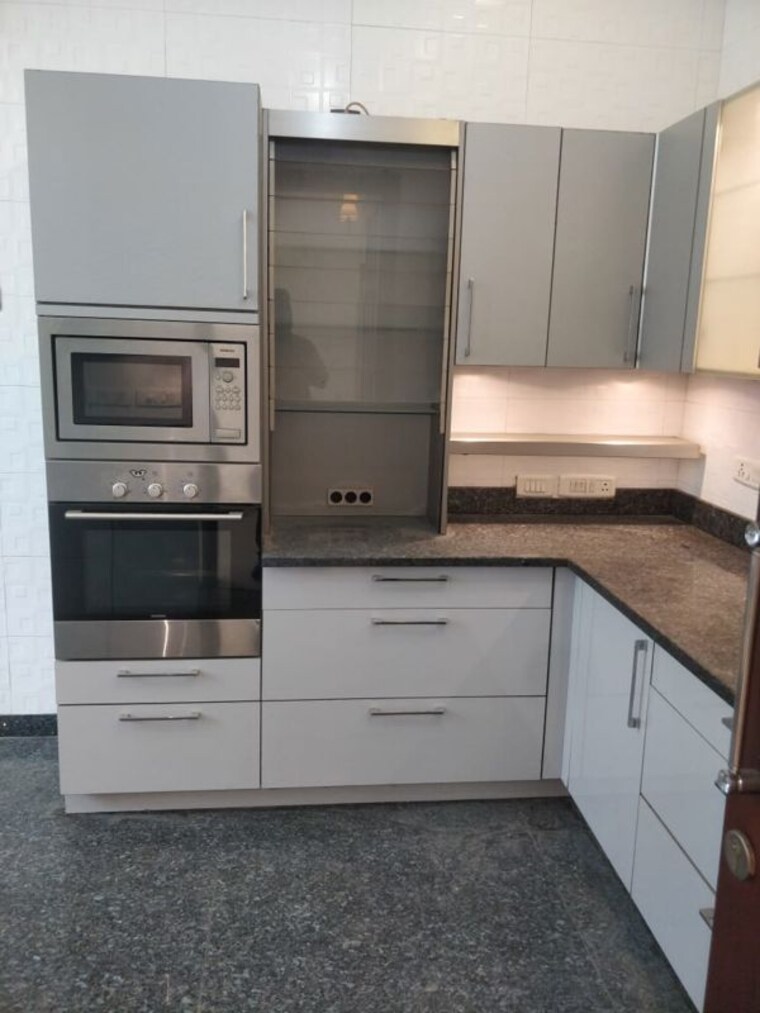 Kitchen, defence colony 4 Bedroom 5000 Sq.Ft. Apartment In Defence Colony Delhi 10790522