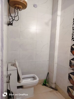 Bathroom in 3 BHK Apartment at Khirki Extension – for Rent