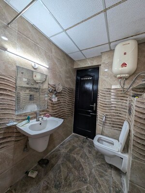 Bathroom in 3 BHK Apartment at SDS NRI Residency Omega II, Omega Ii Greater Noida – for Sale