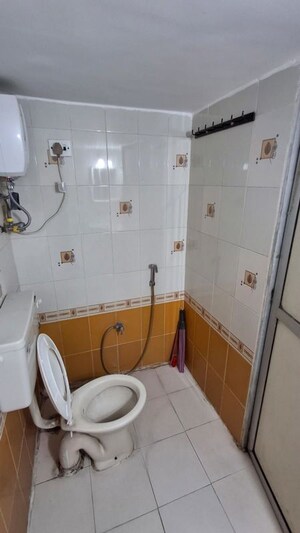 Bathroom in 1 BHK Apartment at Srushti Complex Mumbai, Ghodbunder Road – for Rent