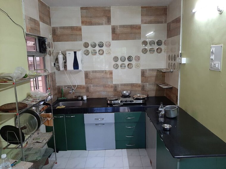 Kitchen, wadhwani-mayureshwar-sai-nisarg-park-chs 2 Bedroom 825 Sq.Ft. Apartment In Pimple Saudagar Pune 10790560