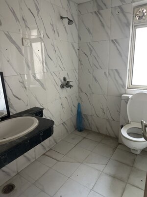 Bathroom in 2.5 BHK Apartment at Nimbus The Golden Palm, Sector 168 – for Rent
