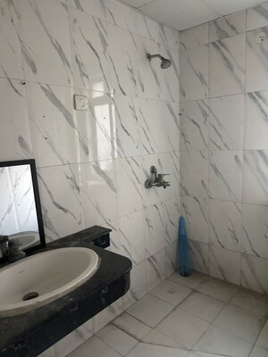 Team Area in 2.5 BHK Apartment at Nimbus The Golden Palm, Sector 168 – for Rent