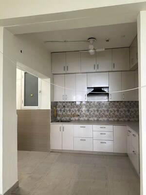 Kitchen in 3 BHK Apartment at Nimbus The Golden Palm, Sector 168 – for Rent