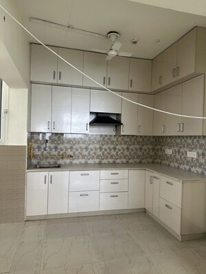 Kitchen in 3 BHK Apartment at Nimbus The Golden Palm, Sector 168 – for Rent