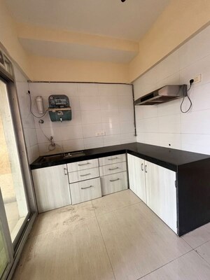 Kitchen in 2 BHK Apartment at Ace Aviana, Kasarvadavali – for Rent