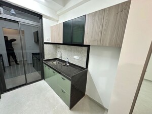 Kitchen in 1 BHK Apartment at Dhamji Shamji Mahavir Spring Tulip Phase 1, Pokhran Road No Two – for Rent