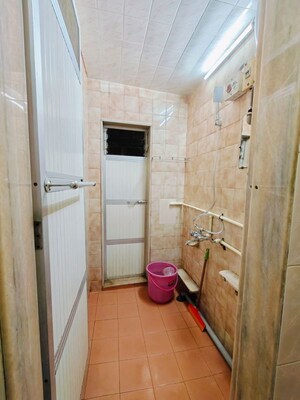 Bathroom in 2 BHK Apartment at Woodland Apartment, Andheri West – for Rent