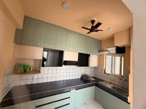 Kitchen in 2 BHK Apartment at Tulsiani Urban Woods, Sushant Golf City – for Rent