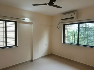 Room in 2 BHK Apartment at Dhanori – for Rent