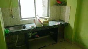 Kitchen in 1 RK Apartment at Pandav Enclave, Mira Road – for Sale