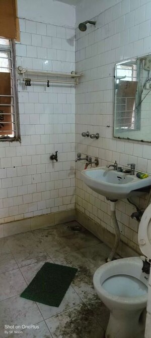 Bathroom in 3 BHK Apartment at Dwarka – for Rent