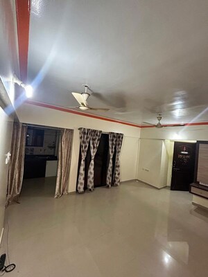 Living Room in 2 BHK Apartment at Saarrthi Shilp, Kothrud – for Rent