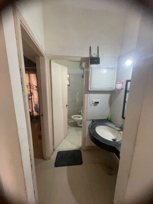 Bathroom in 3 BHK Apartment at Godrej Horizon, Mohammadwadi – for Rent