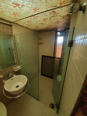 Bathroom in 1 BHK Apartment at Duplex Heights, Andheri West – for Rent