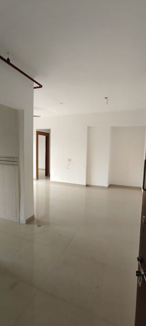 Living Room in 2 BHK Apartment at Tanvi Eminence, Mira Road – for Rent