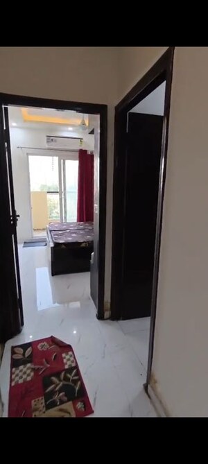 Building Lobby in 2 BHK Apartment at Pivotal Riddhi Siddhi, Sector 99 – for Rent
