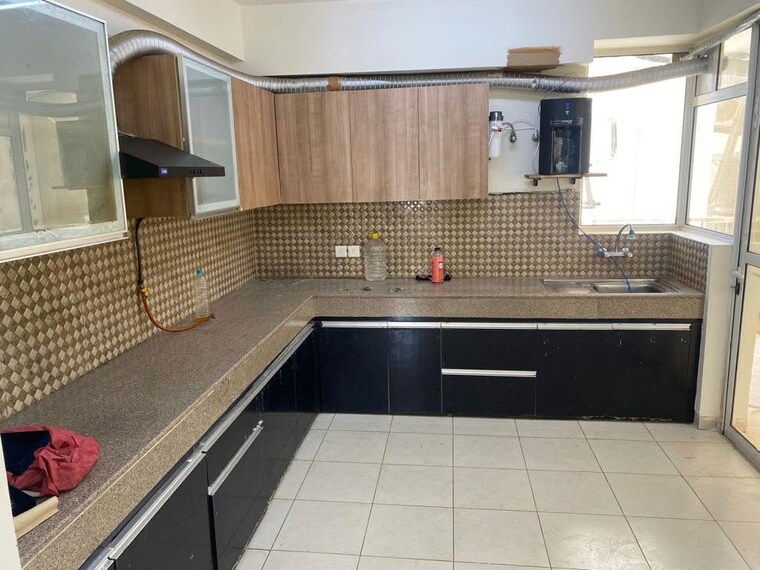 Kitchen, emaar-emerald-hills-phase-2 4 Bedroom 1750 Sq.Ft. Apartment In Sector 65 Gurgaon 10790931